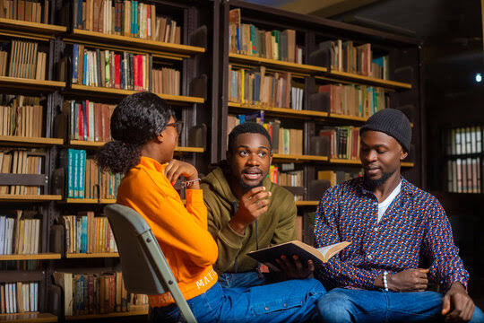 Students studying together in a library